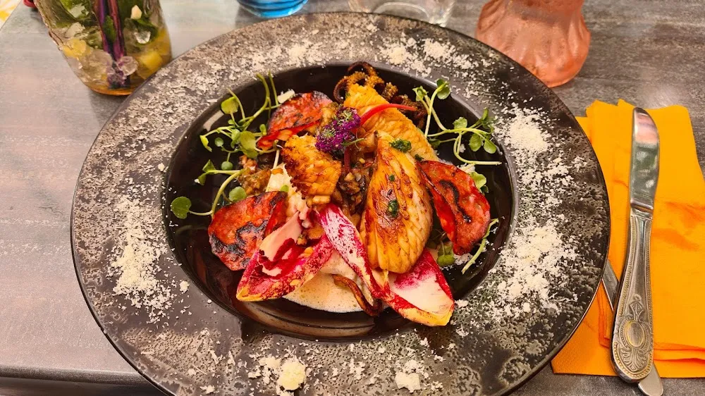 Seiche de Criée À la Plancha Risotto Fondant Au Parmesan Crème de Chorizo Ibérique